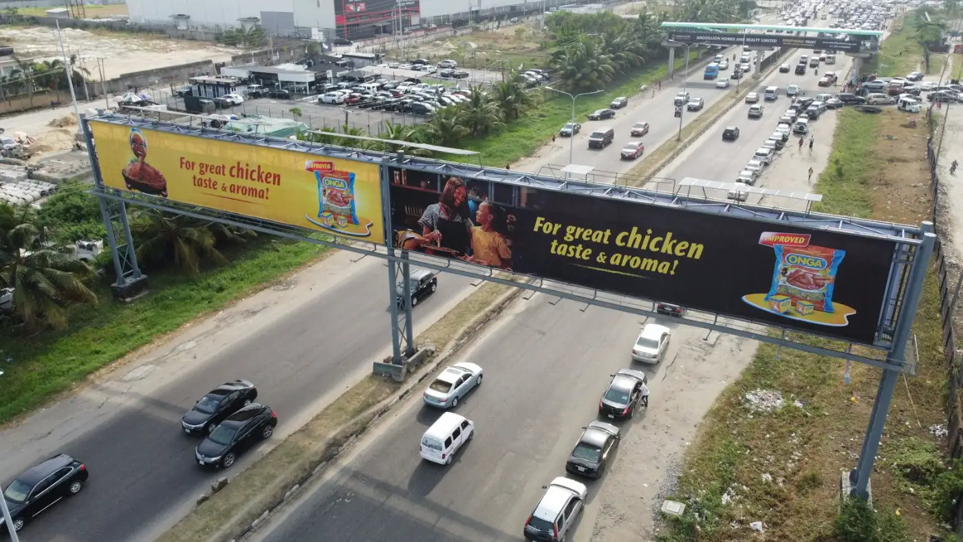 Billboards above a busy Lagos highway