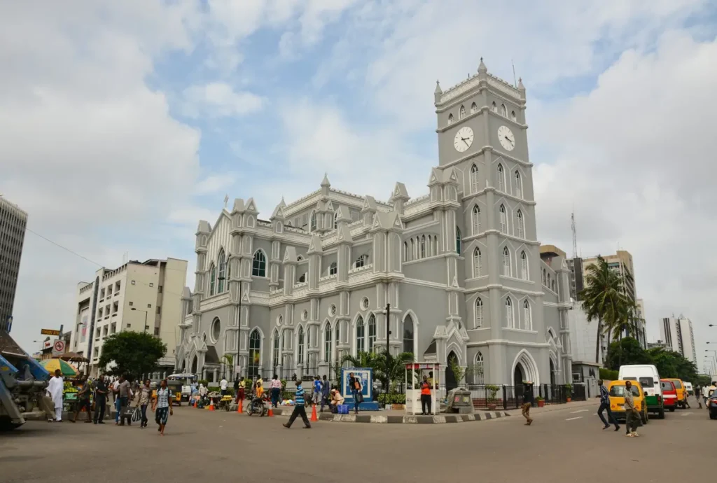 Historic white building with clock tower in Lagos