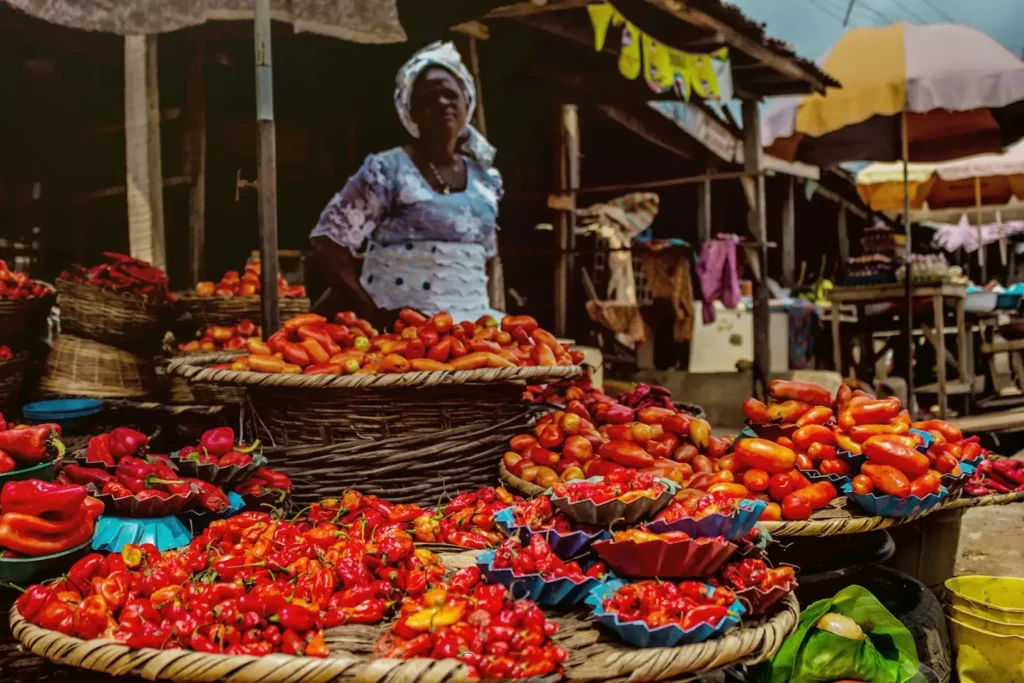 Trader at a fruit stall in Nigeria